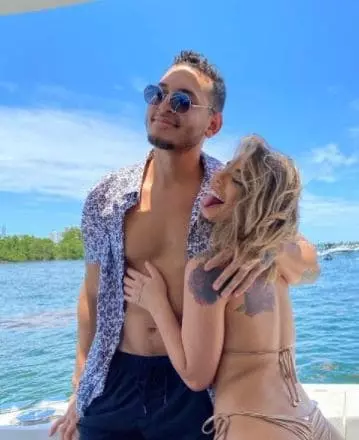 Gina Valentina with her boyfriend in a yacht